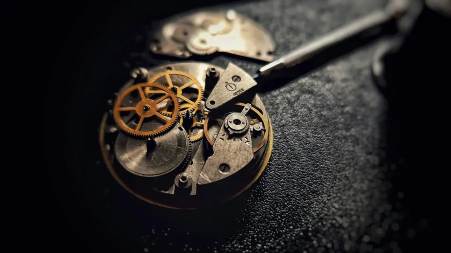 A watchmaker's bench with fine tools.