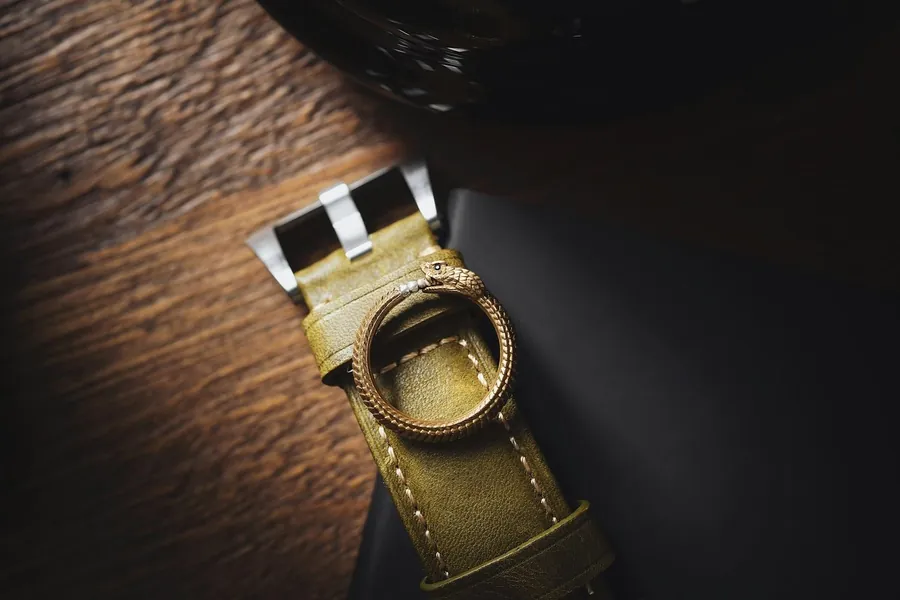 Macro detail of a stitched leather YELM strap.